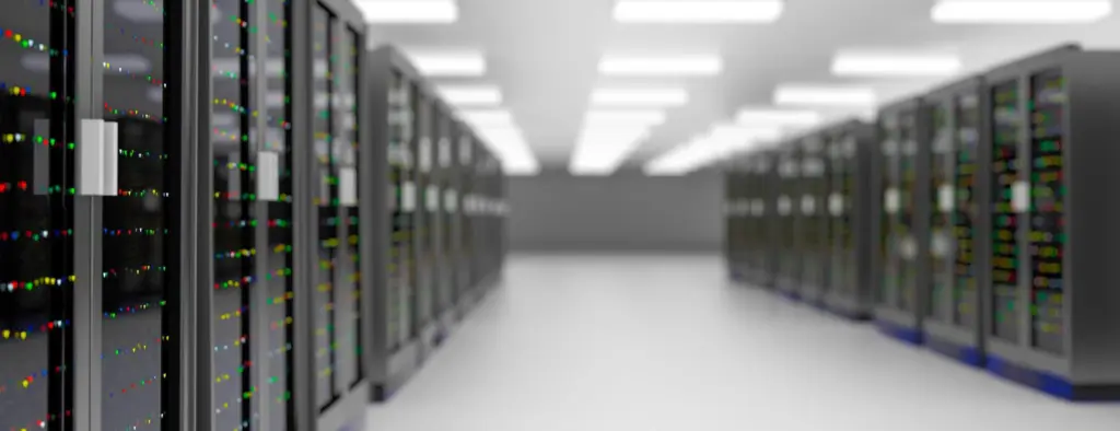 Modern data center room with rows of network server racks